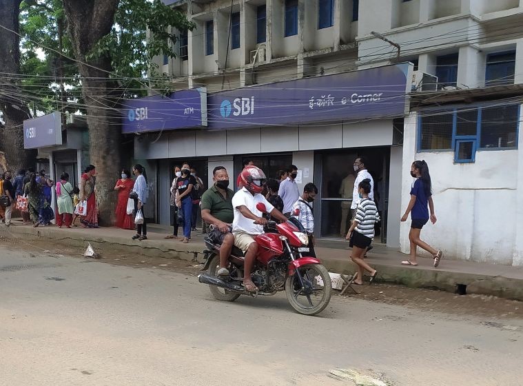 People wear face masks amid the COVID-19 induced lockdown restrictions in Dimapur. (Morung Photo)